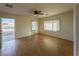 Spacious living room with hardwood floors and ample natural light, perfect for relaxing or entertaining at 211 Kansas Ave, Henderson, NV 89015