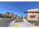 Falcon Crest sign in the community with landscaping and mountain views at 2194 Pigeon Hawk St, Las Vegas, NV 89138