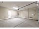 Spacious garage with smooth concrete flooring and white door and walls at 2194 Pigeon Hawk St, Las Vegas, NV 89138