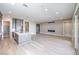 This kitchen features a large island, pantry, and views into the living room at 2194 Pigeon Hawk St, Las Vegas, NV 89138