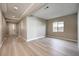 This spacious living room features wood floors and a large window at 2194 Pigeon Hawk St, Las Vegas, NV 89138