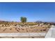 Community park with desert landscaping and walking path at 2194 Pigeon Hawk St, Las Vegas, NV 89138