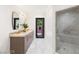 Stylish bathroom with dual sinks, modern fixtures, and a glass shower at 22 Anthem Pointe Ct, Henderson, NV 89052
