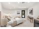 Neutral Primary bedroom with comfortable bed, art, and ornate glass door at 22 Anthem Pointe Ct, Henderson, NV 89052
