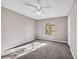 Neutral bedroom features a ceiling fan for climate control, and a window for natural light at 2200 S Fort Apache Rd # 2049, Las Vegas, NV 89117