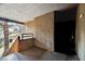 Entry to unit features concrete, partially covered patio with exterior lighting and the front door at 2200 S Fort Apache Rd # 2049, Las Vegas, NV 89117