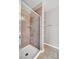 Updated bathroom featuring an enclosed shower with tiled walls and shelving niche at 2200 S Fort Apache Rd # 2049, Las Vegas, NV 89117