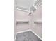 A walk-in closet, complete with shelving and a hanging rod for storage needs at 2200 S Fort Apache Rd # 2049, Las Vegas, NV 89117