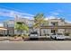 Attractive multi-unit building with well-maintained landscaping and ample parking spaces at 2325 Windmill Pkwy # 1124, Henderson, NV 89074