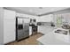 Stylish kitchen with stainless steel appliances, ample cabinet space, and sleek countertops for a modern appeal at 2325 Windmill Pkwy # 1124, Henderson, NV 89074