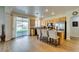 Bright kitchen with stainless steel appliances, granite countertops, and a cozy breakfast bar at 2418 Brockton Way, Henderson, NV 89074