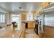 Bright kitchen with stainless steel appliances, granite countertops, and a cozy breakfast bar at 2418 Brockton Way, Henderson, NV 89074