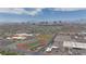 High aerial view overlooking a city featuring a sports field and cityscape with clear sky at 2471 Old Forge Ln # 103, Las Vegas, NV 89121