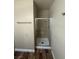 Enclosed shower with tile surround and gold fixtures at 2700 N Rainbow Blvd # 1084, Las Vegas, NV 89108