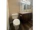 The bathroom showcases a toilet, vanity with granite countertop, and modern fixtures at 2700 N Rainbow Blvd # 1084, Las Vegas, NV 89108