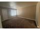Bedroom features neutral walls, plush carpeting, and a large window, creating a cozy and inviting space at 2700 N Rainbow Blvd # 1084, Las Vegas, NV 89108