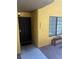 Exterior view of front door with window and small planter at 2700 N Rainbow Blvd # 1084, Las Vegas, NV 89108