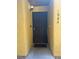 Exterior front door with black metal security screen and light fixture at 2700 N Rainbow Blvd # 1084, Las Vegas, NV 89108