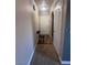 Interior view of hallway with chair and front door at 2700 N Rainbow Blvd # 1084, Las Vegas, NV 89108
