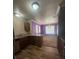 Kitchen with breakfast bar and view into dining room at 2700 N Rainbow Blvd # 1084, Las Vegas, NV 89108