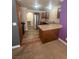 Galley-style kitchen with stainless steel appliances and breakfast bar at 2700 N Rainbow Blvd # 1084, Las Vegas, NV 89108