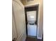 A compact laundry area showcases a stacked washer and dryer in a small space at 2700 N Rainbow Blvd # 1084, Las Vegas, NV 89108