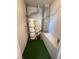 The small utility room features a water heater, HVAC equipment, and painted green flooring at 2700 N Rainbow Blvd # 1084, Las Vegas, NV 89108