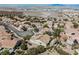 Serene aerial view of a community with desert landscaping and mountain backdrop at 3004 Canton Hills St, Henderson, NV 89052