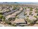 A neighborhood street is displayed in this sunny aerial view of the community at 3004 Canton Hills St, Henderson, NV 89052