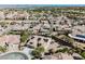 Aerial view of a home with solar panels in a desert community at 3004 Canton Hills St, Henderson, NV 89052
