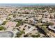 Aerial view of a home with solar panels in a desert community at 3004 Canton Hills St, Henderson, NV 89052