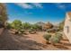 A wide shot of the landscaped backyard at 3004 Canton Hills St, Henderson, NV 89052