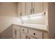 Built-in bar area featuring storage cabinets, a countertop, and a sink at 3004 Canton Hills St, Henderson, NV 89052