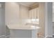 Cozy bar area with a sink, white cabinets and quartz countertops at 3004 Canton Hills St, Henderson, NV 89052