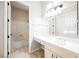 Bathroom with a vanity, large mirror, lots of lighting, and walk in shower at 3004 Canton Hills St, Henderson, NV 89052