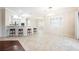 Bright dining room with tiled floors that provide a seamless transition to the adjacent living spaces at 3004 Canton Hills St, Henderson, NV 89052