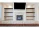 Close up of the living room fireplace and built in shelving at 3004 Canton Hills St, Henderson, NV 89052