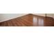 Close up showing the rich color and wood grain texture of the hardwood flooring at 3004 Canton Hills St, Henderson, NV 89052