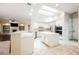 Modern kitchen featuring white cabinetry, a center island, and stainless steel appliances at 3004 Canton Hills St, Henderson, NV 89052