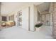 Cozy outdoor patio with comfortable seating, a fireplace and decorative entryway at 3004 Canton Hills St, Henderson, NV 89052