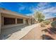 Covered patio featuring stone pillars, a walkway, and access to the home at 3004 Canton Hills St, Henderson, NV 89052