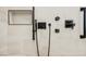 Modern shower with designer fixtures, and recessed niche, offering both style and functionality at 3004 Canton Hills St, Henderson, NV 89052