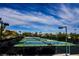 Outdoor tennis courts with green fencing and multiple courts at 3004 Canton Hills St, Henderson, NV 89052