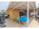 A view of the backyard with a covered patio for outdoor activities and lounging at 304 S Crestline Dr, Las Vegas, NV 89107