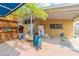 Large backyard with a covered patio area providing shelter and space for storage at 304 S Crestline Dr, Las Vegas, NV 89107