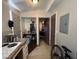 Hallway featuring doors, and tile flooring at 304 S Crestline Dr, Las Vegas, NV 89107