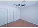 Light bedroom with a ceiling fan and a closet for storage at 3667 Descanso St, Las Vegas, NV 89121
