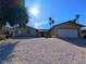 Charming single-story home with a low-maintenance gravel front yard, desert landscaping and attached garage at 3667 Descanso St, Las Vegas, NV 89121