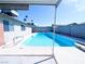 Cool off in this backyard swimming pool with diving board and relaxing sunshine at 3667 Descanso St, Las Vegas, NV 89121