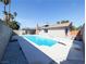 Enjoy this backyard swimming pool with diving board at 3667 Descanso St, Las Vegas, NV 89121